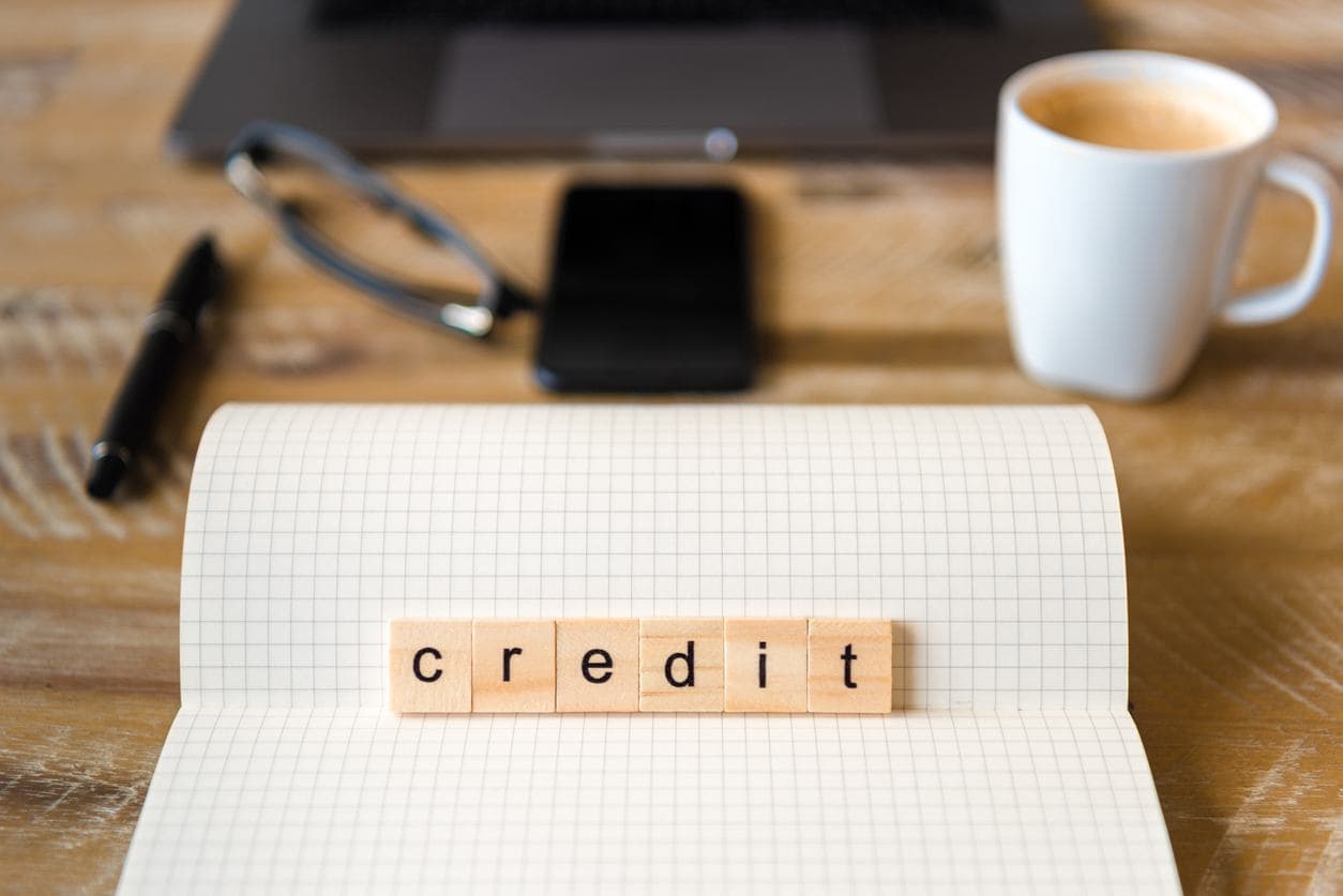 credit spelled with blocks