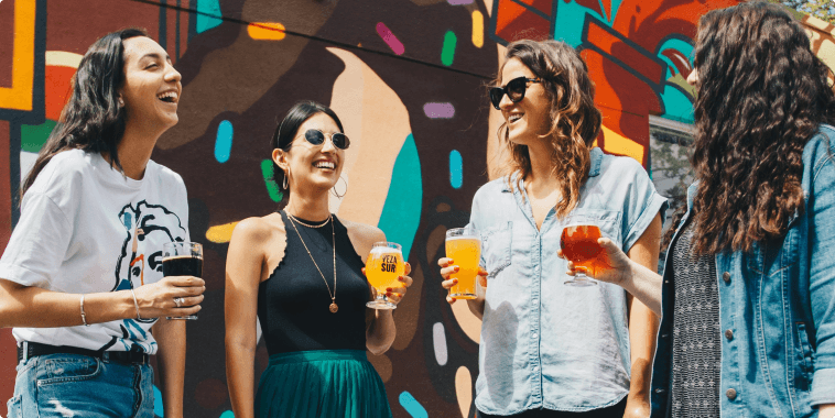 Small business owner hosting a happy hour for valued clients.